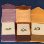 THREE MODERN SILVER RINGS ALL BOXED