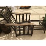 A VINTAGE OAK RECLINER CHAIR FRAME WITH BARLEY TWIST SUPPORTS