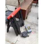 A PAIR OF PLASTIC COMPACT SAWHORSE BENCHES, AN EXTENSION CABLE AND A TOOLBOX WITH CONTENTS