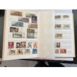 A STAMP ALBUM CONTAINING RUSSIAN STAMPS