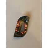 A DRILLED IRIDESCENT STONE PENDANT