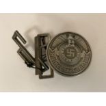 A GERMAN BELT BUCKLE