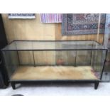 A GLASS DISPLAY CABINET 182CM X 92CM X 61CM A/F