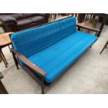 A BELIEVED GREAVES AND THOMAS RETRO TEAK SOFA (CONVERTS TO A BED)