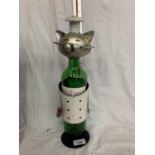 A METAL CAT WINE BOTTLE HOLDER