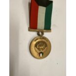 A LIBERATION OF KUWAIT MEDAL AND RIBBON