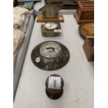 TWO CLOCKS TO INCLUDE A EUROPA ON A WOODEN BASE, AN ONYX EXAMPLE, A BAROMETER AND A MINATURE SUNDIAL