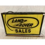 A 'LAND ROVER SALES' ILLUMINATED LIGHT BOX SIGN