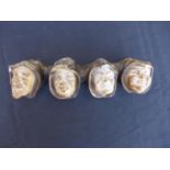 A PIPE HOLDER WITH FOUR FACES
