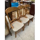 THREE CARVED OAK DINING CHAIRS