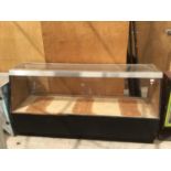 A LARGE GLASS DISPLAY CABINET 46CM X 77CM X 53CM