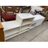 A WHITE BOOKCASE, BEDSIDE CABINET AND CHEST OF THREE DRAWERS