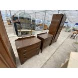 AN OAK WARDROBE, CHEST OF THREE DRAWERS AND DRESSING TABLE