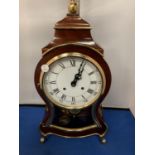 A MAHOGANY AND GILT MANTLE CLOCK