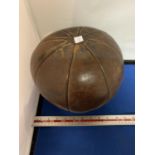 A VINTAGE HEAVY LEATHER MEDICINE BALL