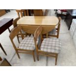 A TEAK DROP LEAF DINING TABLE AND FOUR DINING CHAIRS