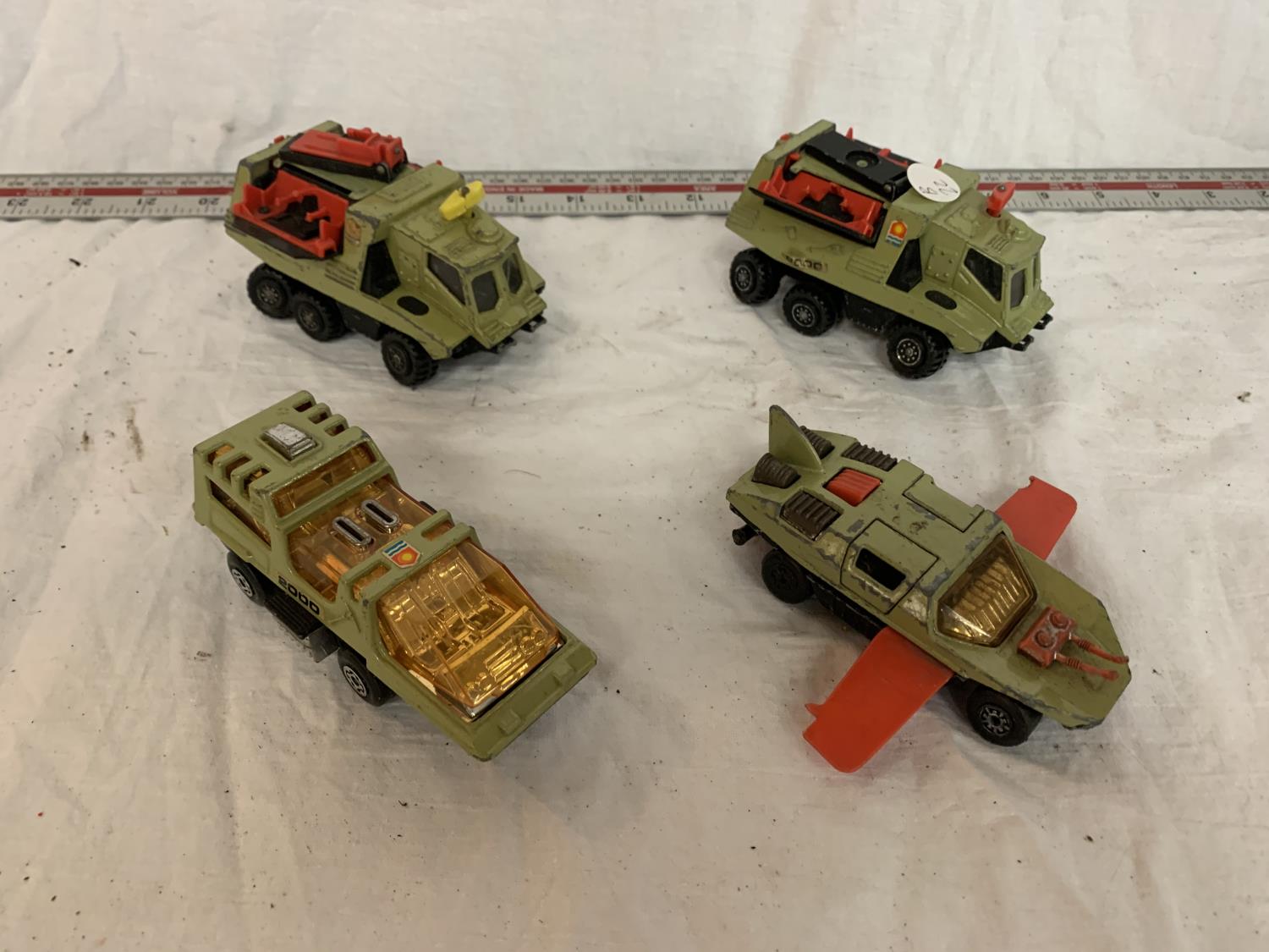 FOUR VINTAGE CORGI AND DINKY CARS