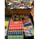 A COLLECTION OF MATERIAL, EMBROIDERY SILKS, SEWING BASKET ETC