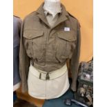 A BRITISH ARMY BATTLE DRESS, SHIRT AND BELT