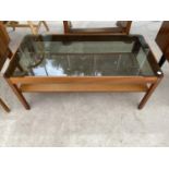 A MYERS RETRO TEAK COFFEE TABLE WITH SMOKED GLASS TOP