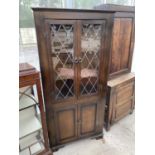 A PRIORY STYLE FLAT FRONT OAK CORNER CUPBOARD WITH TWO LOWER DOORS AND TWO UPPER LEAD GLAZED DOORS