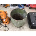 A VINTAGE GALVANISED DOLLY TUB WITH DAMAGE TO BASE