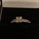 18CT HALLMARKED WHITE GOLD DIAMOND SET QUAD DESIGN RING SIZE Q. TOTAL GROSS WEIGHT 4.4 GRAMS