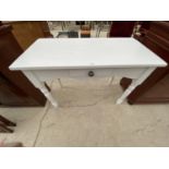 A WHITE SIDE TABLE WITH SINGLE DRAWER