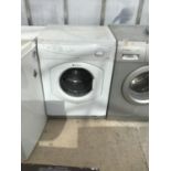 A HOTPOINT DRYER, SLIGHT RUST INSIDE, IN WORKING ORDER