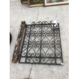 AN ORNATE WROUGHT IRON GATE 84CM X 106CM (INC HINGES)