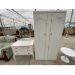 A FRENCH STYLE CREAM WARDROBE AND DRESSING TABLE WITH THREE DRAWERS AND UNFRAMED MIRROR