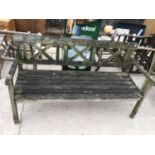 A WOODEN GARDEN BENCH