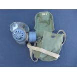 A BRITISH GAS MASK AND CASE