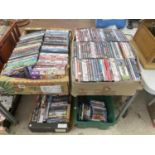 A LARGE QUANTITY OF DVDS, CDS AND VIDEOS