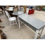 A GREY AND WHITE TABLE, THREE CHAIRS AND SIDE TABLE WITH THREE DRAWERS