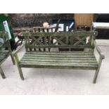 A WOODEN GARDEN BENCH