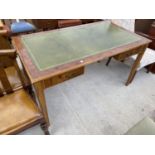 A WALNUT DESK WITH GREEN LEATHER TOP AND TWO DRAWERS
