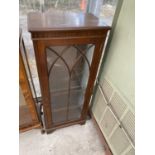 A MAHOGANY CABINET WITH GLAZED PANEL DOOR