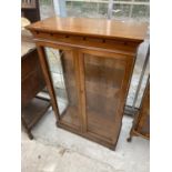 A MAHOGANY CABINET WITH TWO GLAZED DOORS AND SIDE PANELS