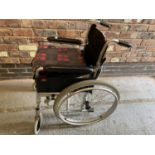 AN ENIGMA WHEELCHAIR IN GOOD CONDITION