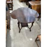 A SMALL MAHOGANY CLOVER LEAF SIDE TABLE