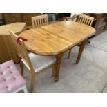 A PINE DINING TABLE AND THREE DINING CHAIRS