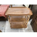 AN ERCOL ELM TEA TROLLEY