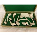 EARLY 20TH CENTURY COLLECTION OF CLAY PIPES VARYING SIZES, HOUSED WITHIN A WOODEN CASE