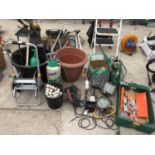 A LARGE QUANTITY OF GARDEN ITEMS TO INCLUDE SPRAYERS, LIGHTS, PRESSURE WASHER, HARDWARE ETC DRILL