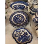 COLLECTION OF BLUE AND WHITE WILL PATTERN WARES, TEAPOTS, PLATES, JUGS, CUPS AND SAUCERS ETC