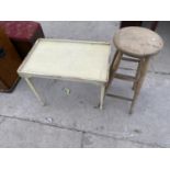 A VINTAGE FOLDING TRAY TABLE AND A PINE STOOL