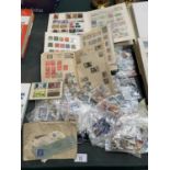 A LARGE QUANTITY OF STAMPS AND ALBUMS FROM AROUND THE WORLD