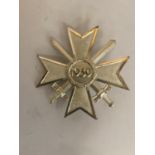 A GERMAN WAR MERIT CROSS WITH CROSSED SWORDS - 1ST CLASS