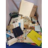 A LARGE QUANTITY OF STAMPS FROM AROUND THE WORLD AND ALBUMS